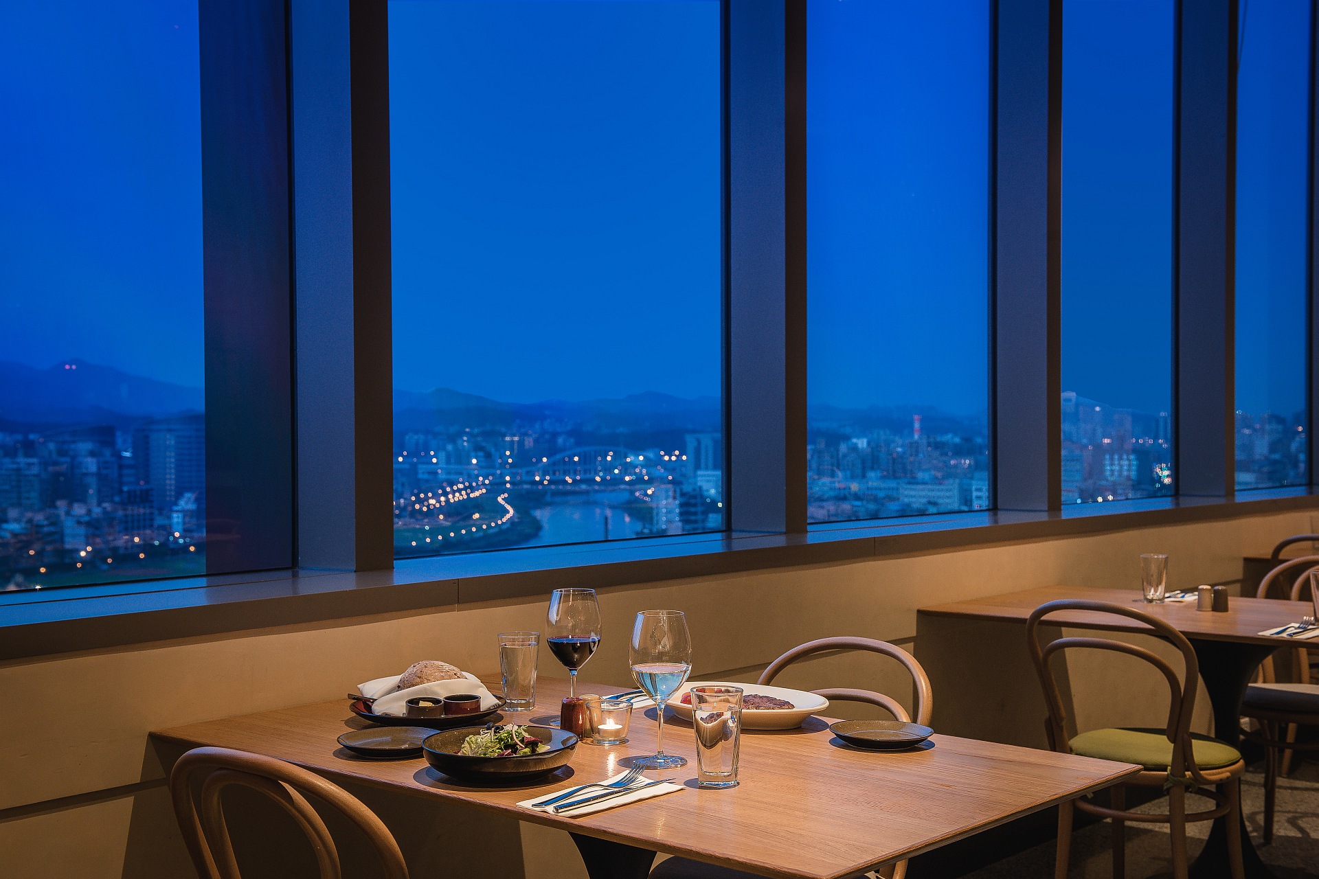 Dinner Special For Two at romantic, river view Que woodfired grill of amba Taipei Songshan hotel 